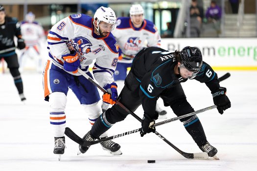 Barracuda's defenseman Ryan Merkley (6) breaks up a pass intended for Yanni Kaldis (8)