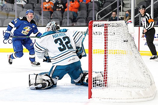 Ben Tardif's (64) shot hits the back of the net to beat goalie Eetu Makiniemi to open the scoring in the first period
