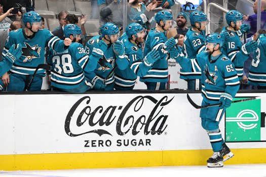 Erik Karlsson (65) celebrates his 3rd period goal with teammates