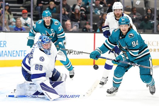 Lightning goalie Andrei Vasilevskiy (88) swats the puck away from Alexander Barabanov (94)