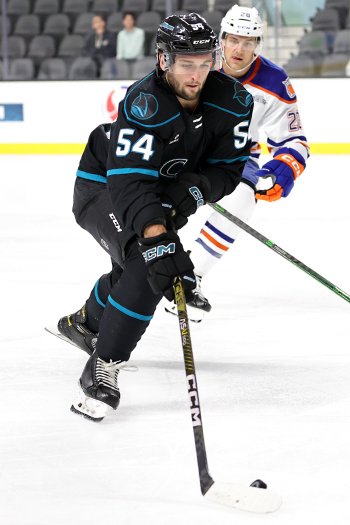 Scott Reedy controls the puck