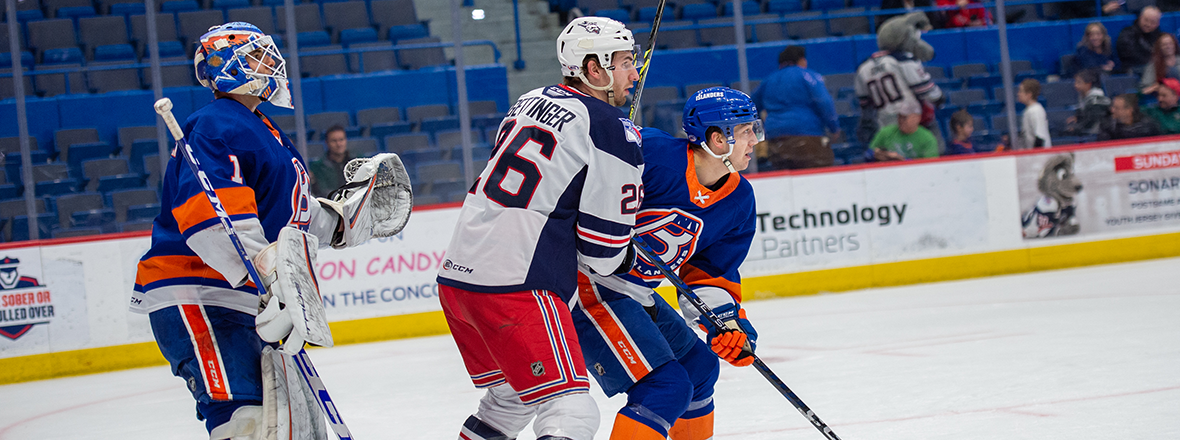 ELSON, CARPENTER EXTEND POINT STREAKS, BUT WOLF PACK FALL TO ISLANDERS 6-2